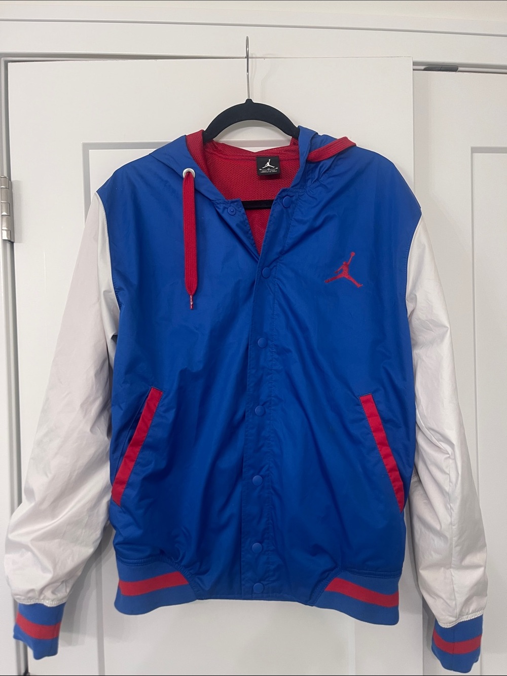 Jordan Blue, White and Red Hooded Varsity Bomber Jacket